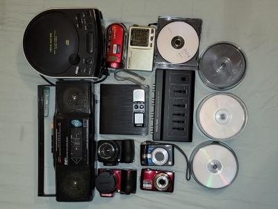 Collection of cameras and CDs